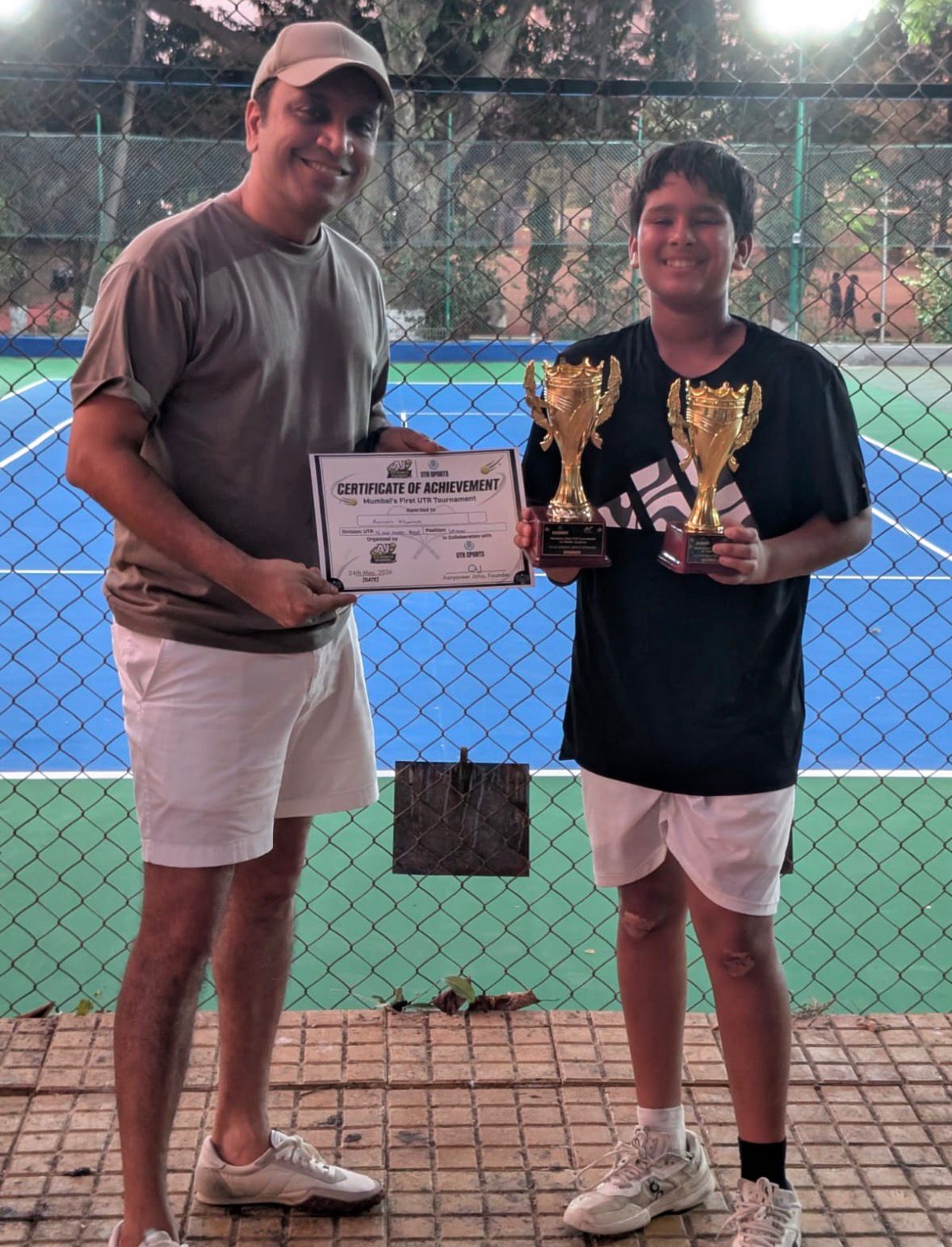U16 Open Singles winner with trophies